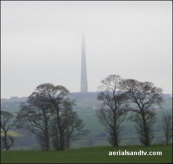 Emley Moor transmitter top in the clouds 351H L10 19kB
